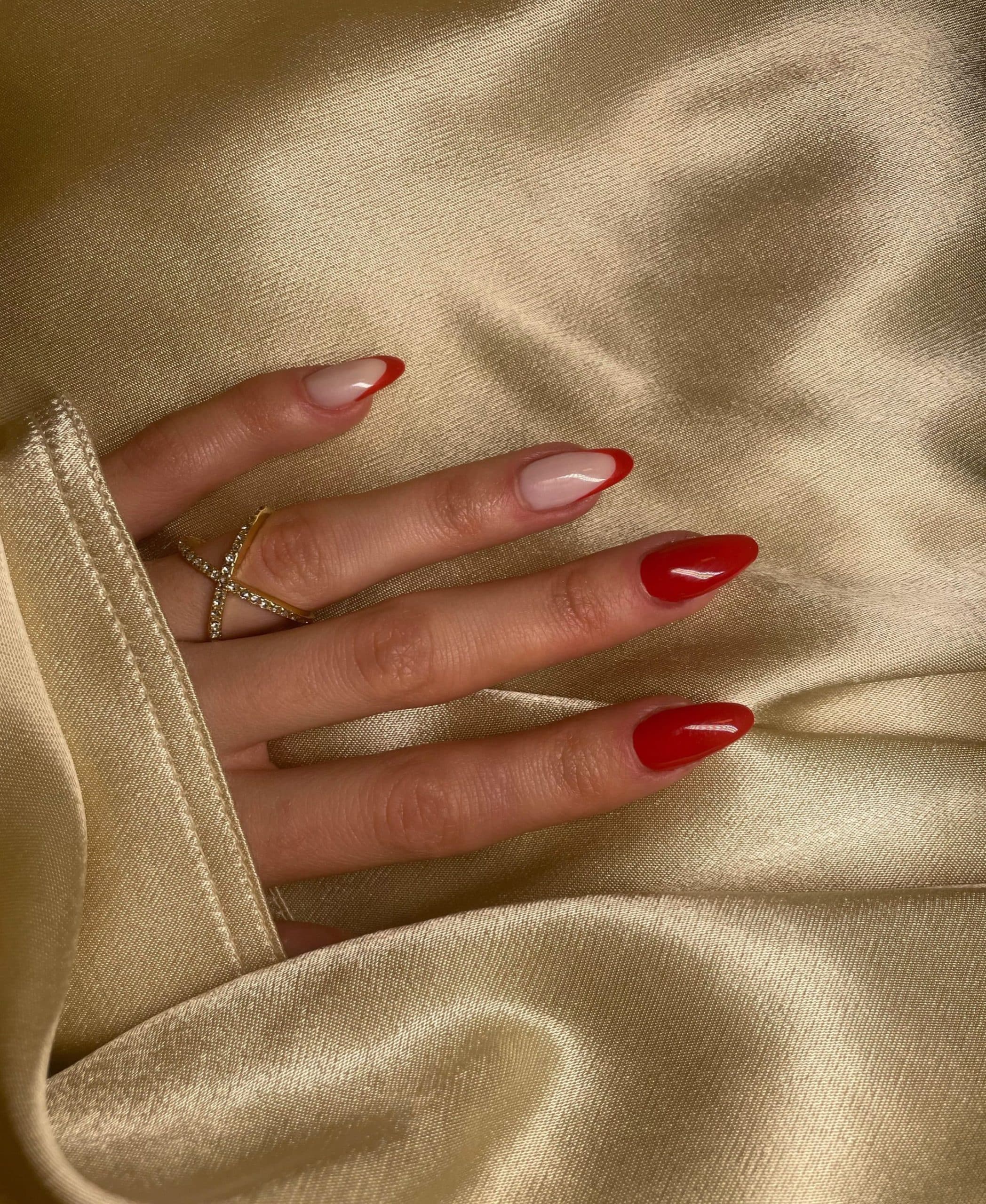 Close-up of a hand with gel nail polish being checked for lifting