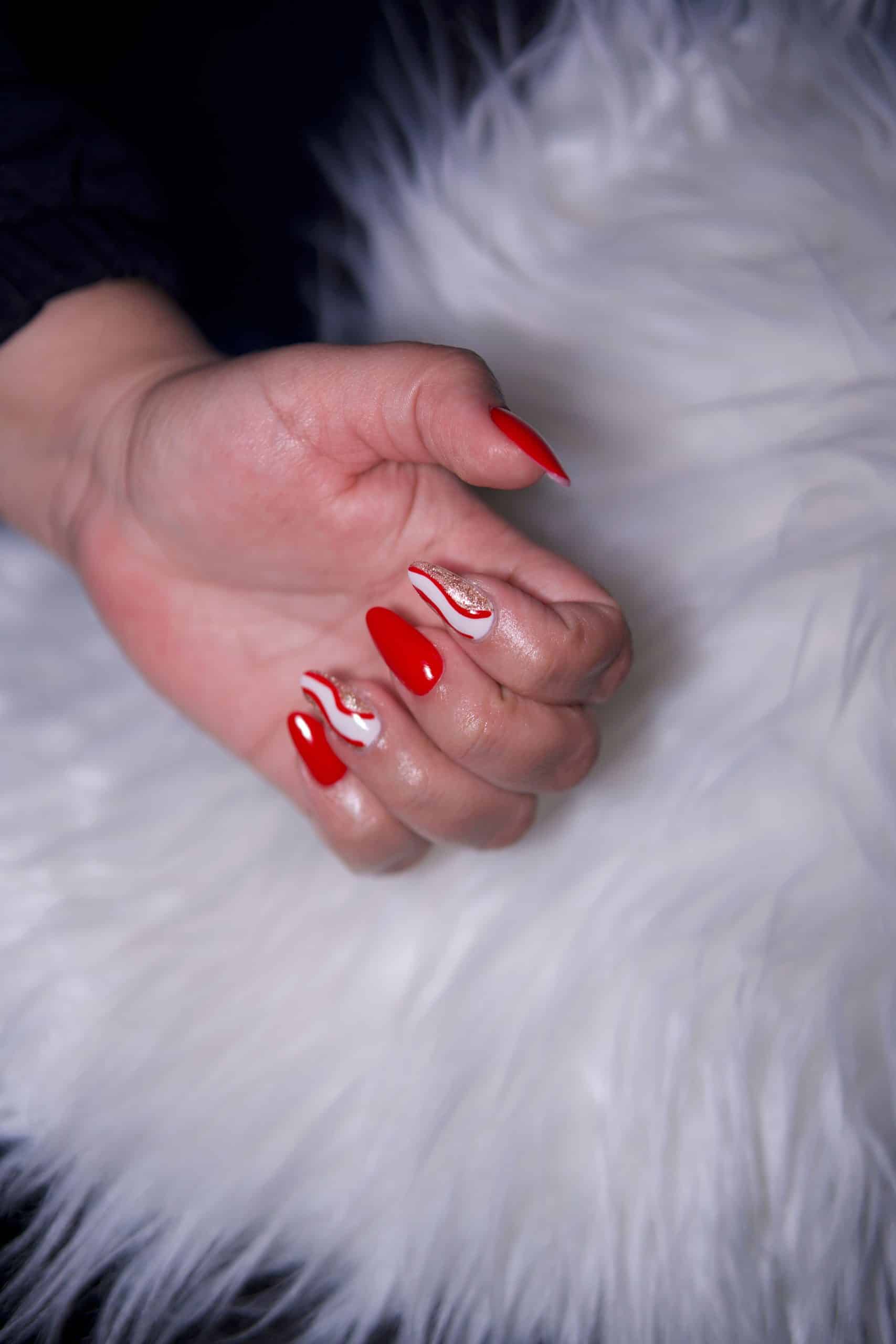 Finished glossy red shellac manicure