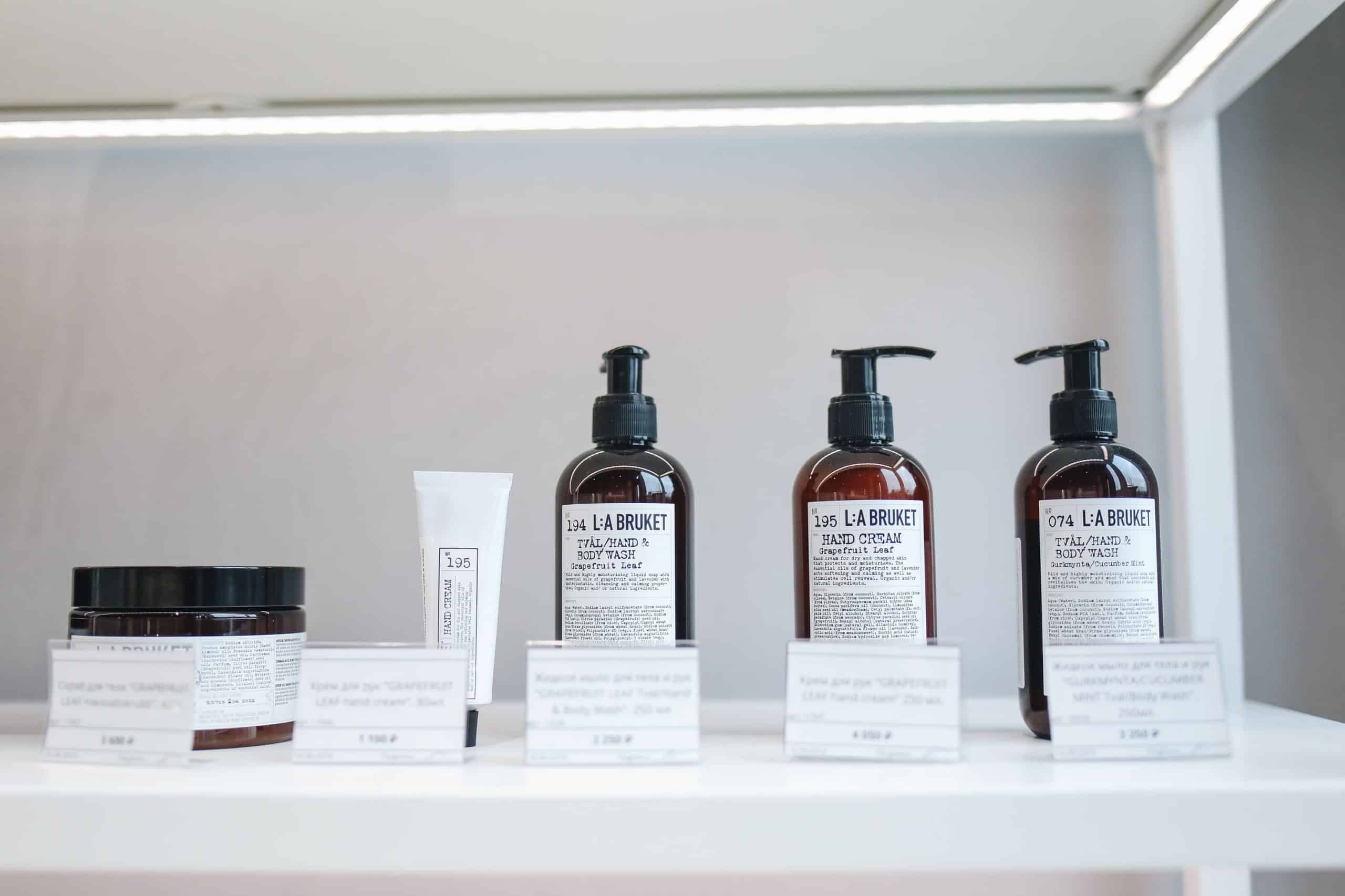 Builder gel and beauty product bottles lined up on a shelf