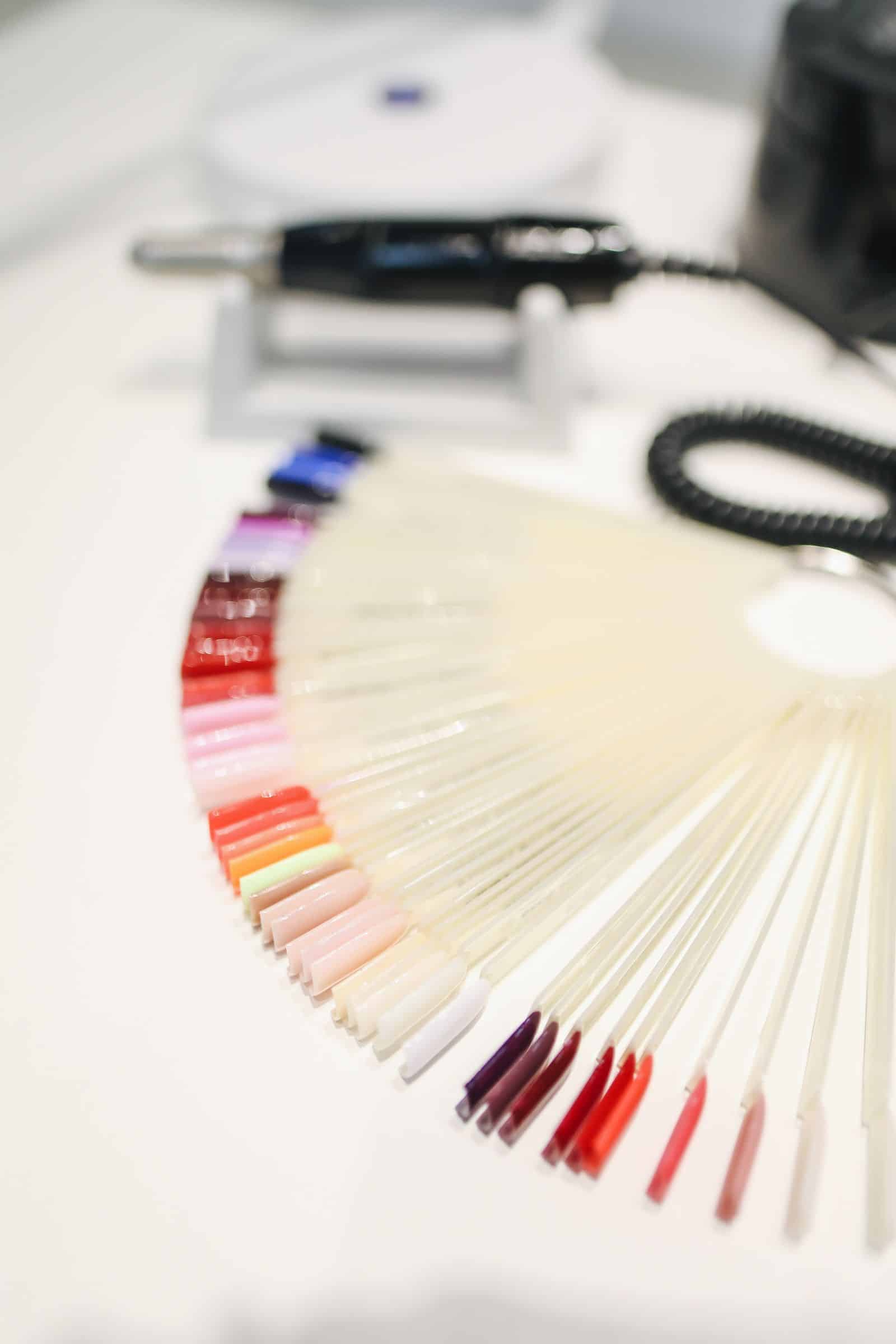 Rows of gel polish color swatches typical of a gel nail kit