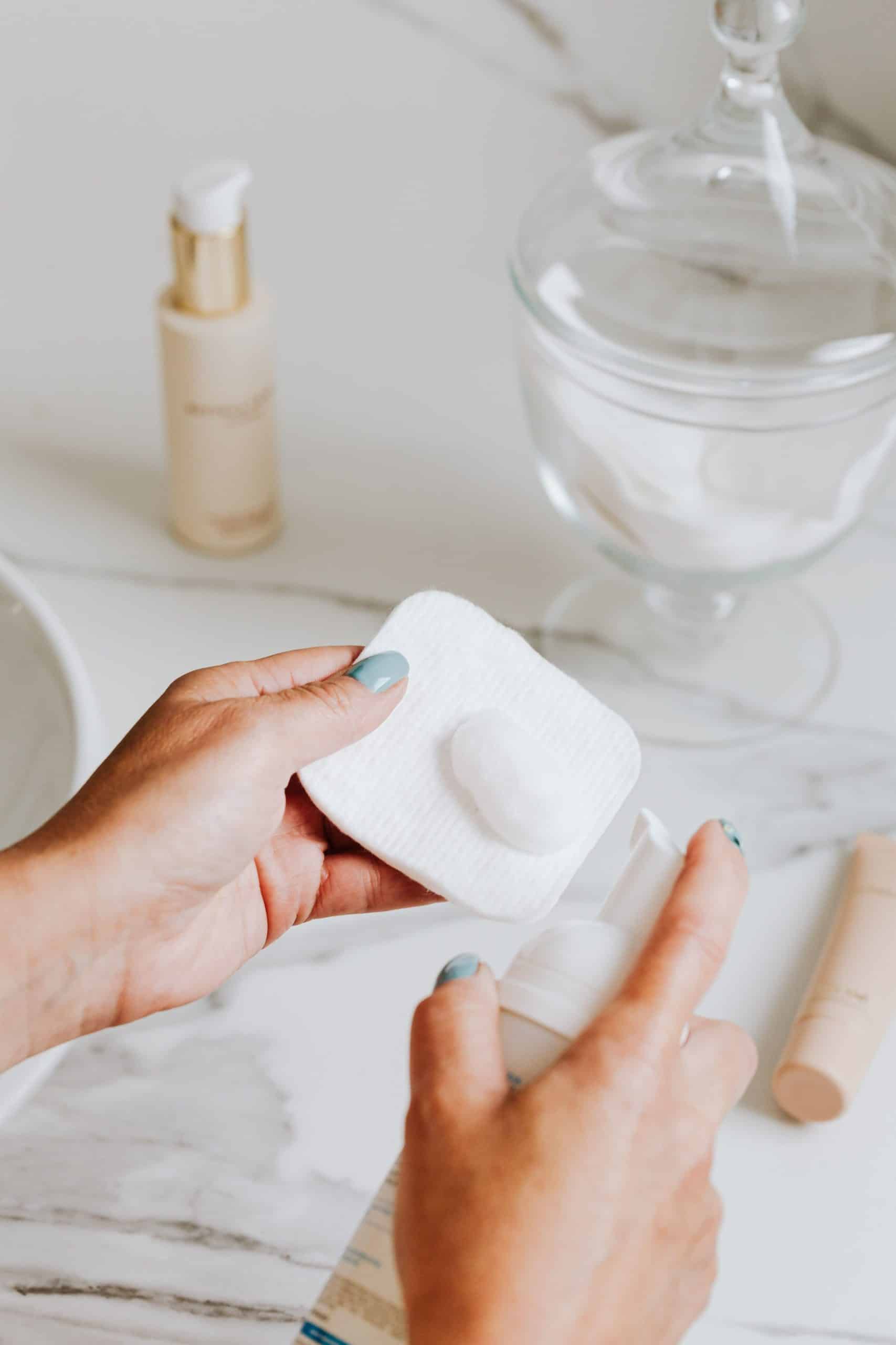 Applying nourishing cream to the hands after builder gel removal