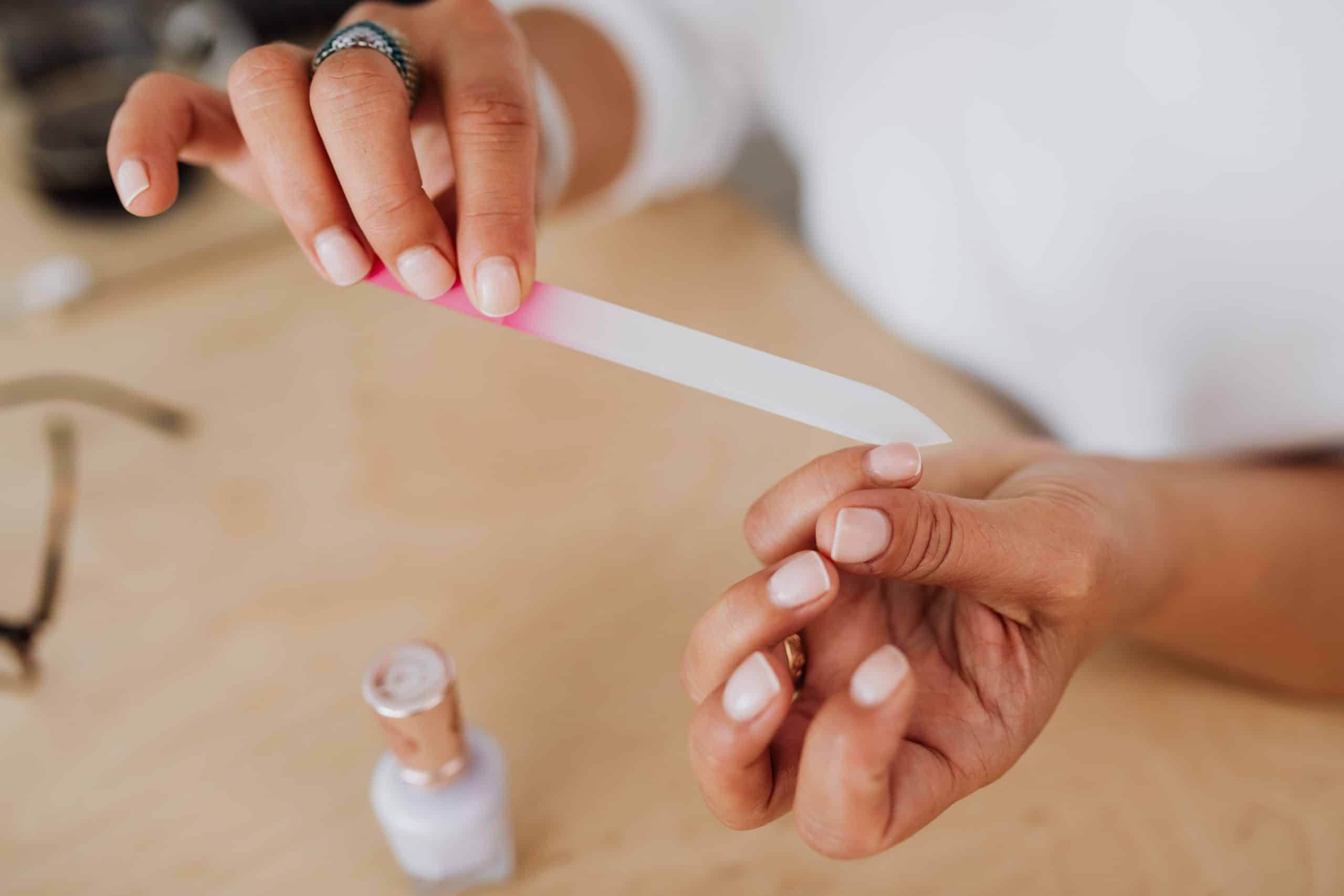 Filing and prepping the nail plate before a soak-off gel overlay like BIAB