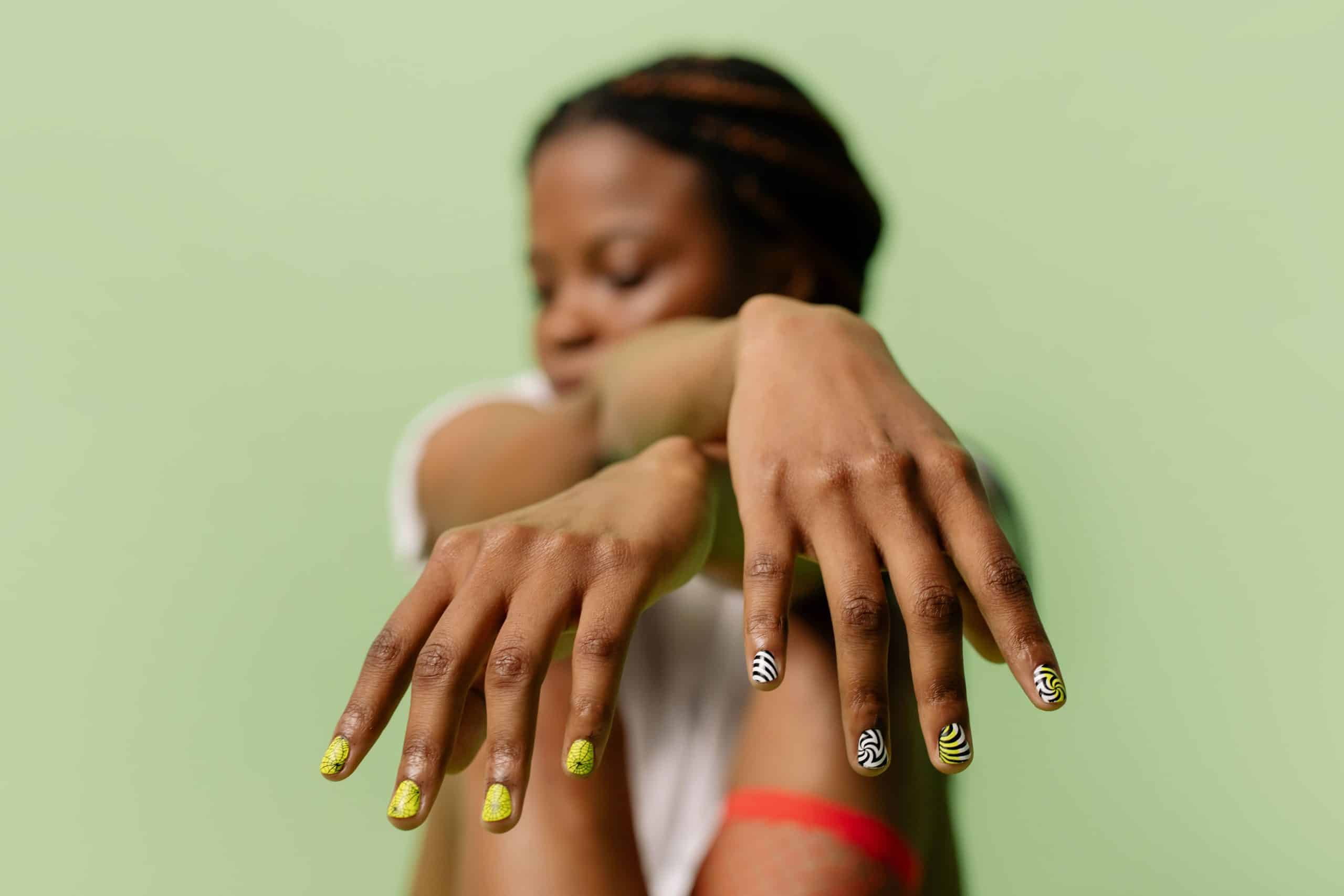 Finished glossy builder gel manicure on a woman's hands