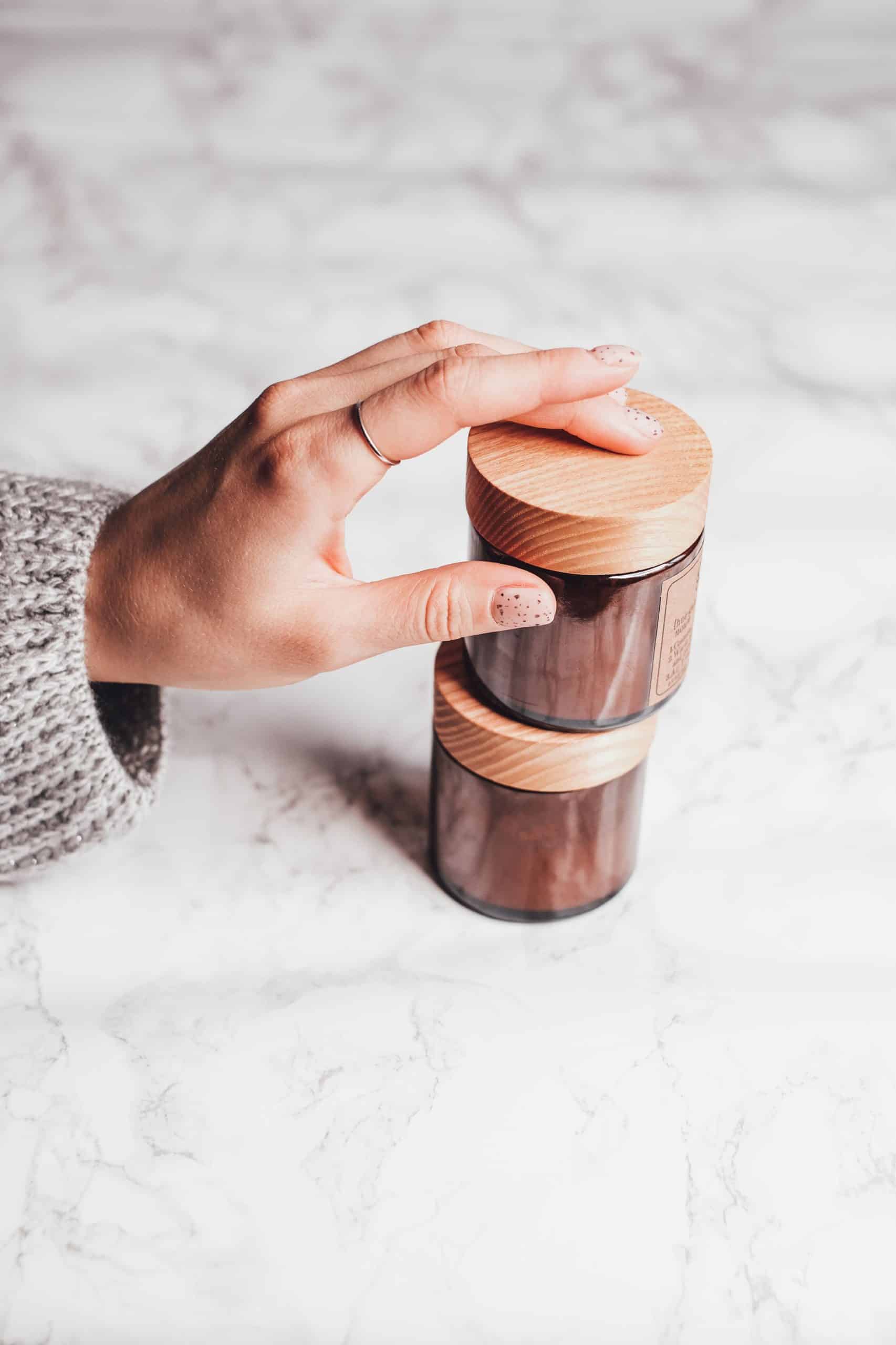 Stacked glass jars used for dip powder nail products